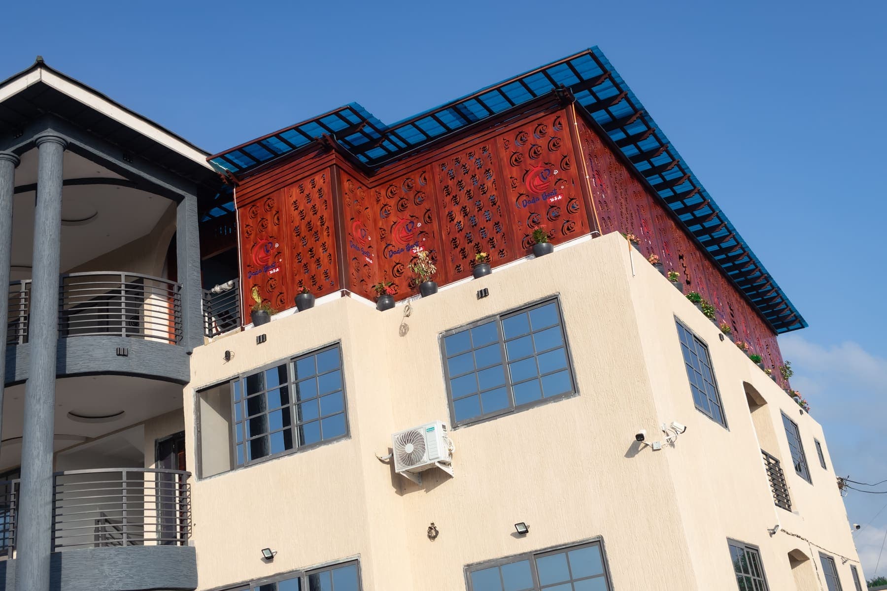 The DeHideout building, with its terracotta lattice and rooftop