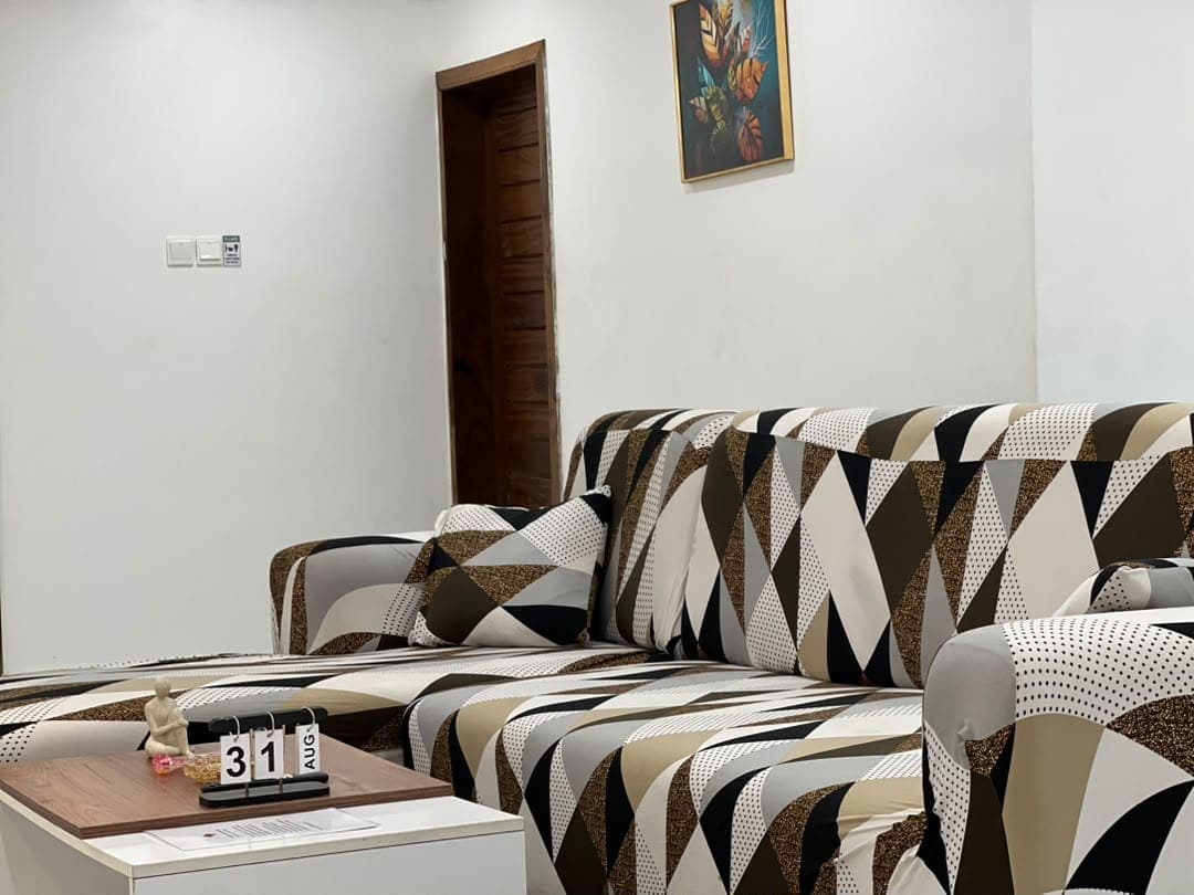 Unit 4 living room with patterned sofa
